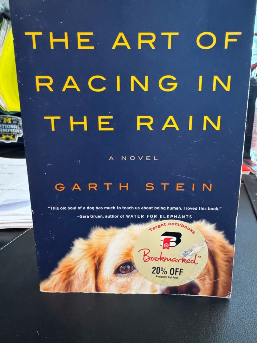 The Art of Racing in the Rain by Garth Stein paperback book.